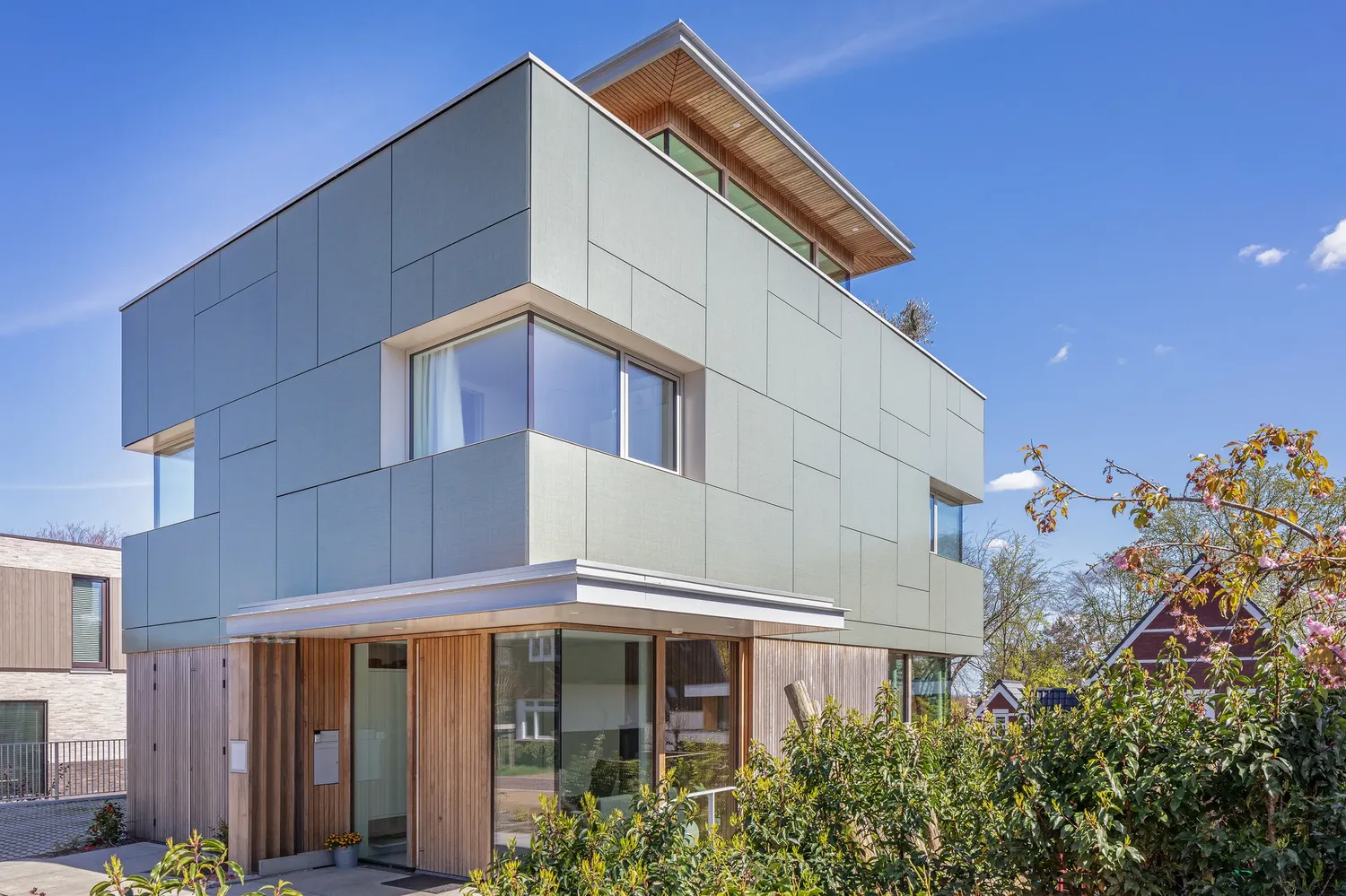 Solar sunroof villa reference with integrated photovoltaic roof panels